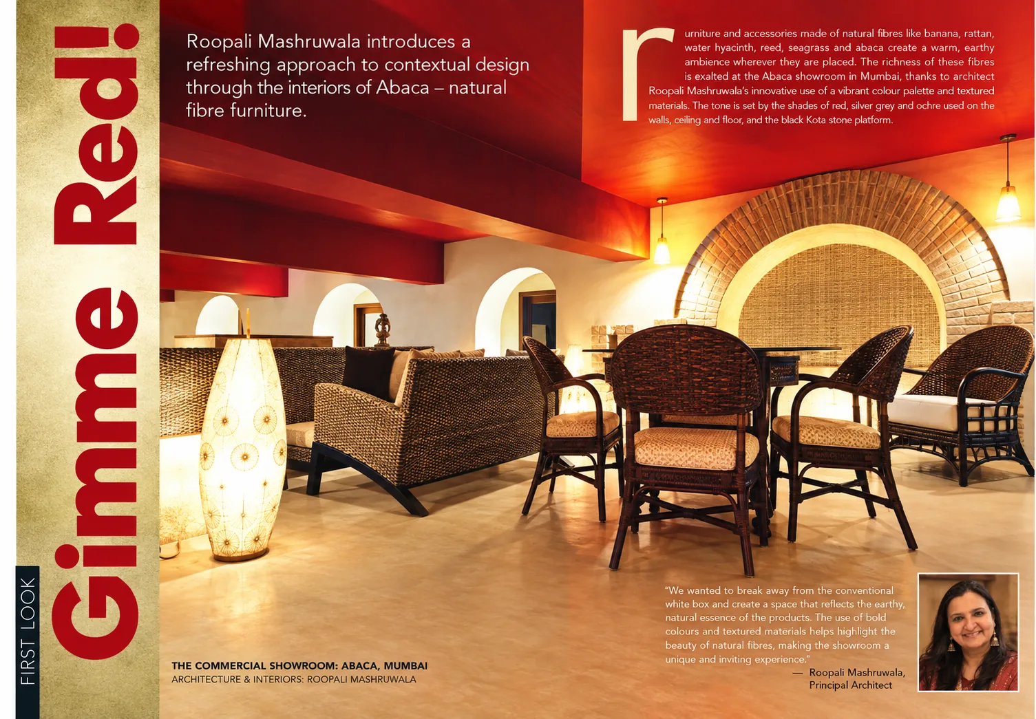 The Gimme Red! spread in Society Interiors: the Abaca dining area under a red ceiling, with natural-fibre chairs, a brick arch and a portrait of Roopali Mashruwala.